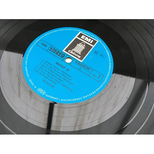 328 - Eight Beatles LPs and two EPs including foreign pressings including Beatles 65, Let It Be and others... 