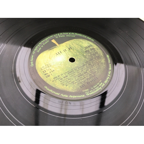 328 - Eight Beatles LPs and two EPs including foreign pressings including Beatles 65, Let It Be and others... 