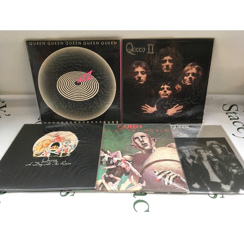 340 - Five Queen LPs comprising A Day At The Races, Queen II and others.