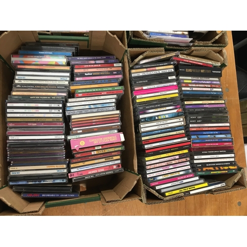 419 - A collection of CDs and audio cassettes by various artists including Elvis Presley, Adam & The Ants,... 