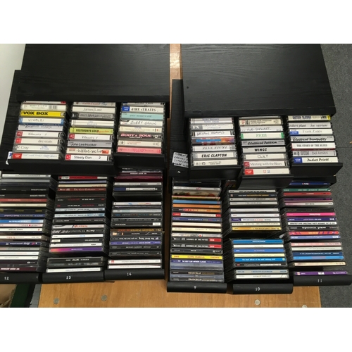 419 - A collection of CDs and audio cassettes by various artists including Elvis Presley, Adam & The Ants,... 