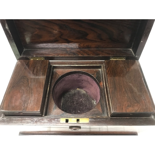 844 - A rosewood tea caddy. 32cm wide, 20cm tall 17cm deep