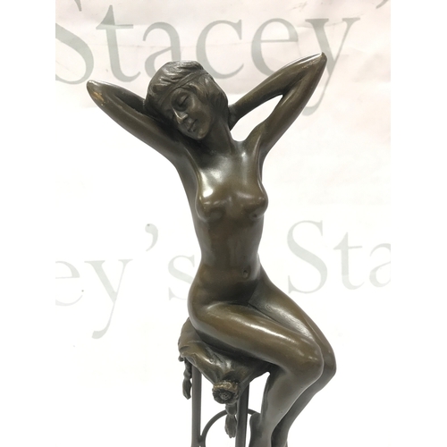 845 - After D H Chiparus, an Art Deco style bronze nude seated woman figure. 28cm tall
