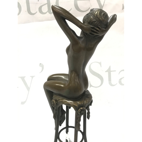 845 - After D H Chiparus, an Art Deco style bronze nude seated woman figure. 28cm tall