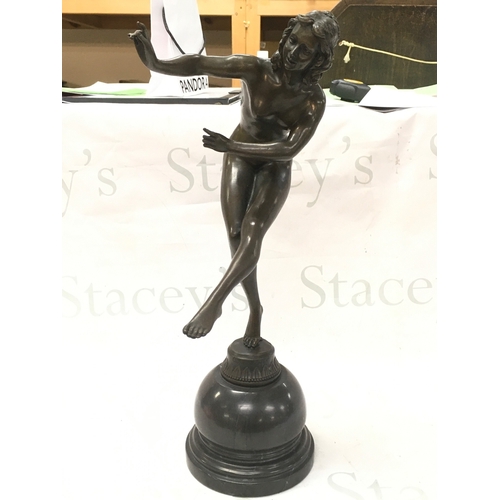 A bronze figure of a dancing nude woman signed Colinet (CL.jr Colinet ...