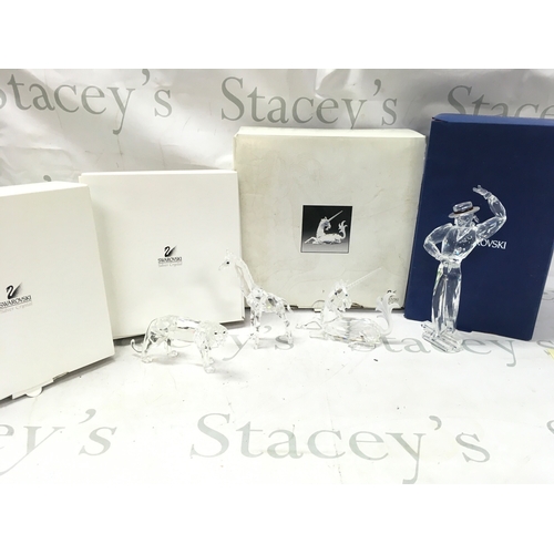 1020 - Four boxed Swarovski crystal glass figures including 2003 SCS Annual Edition 