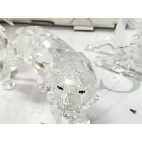1020 - Four boxed Swarovski crystal glass figures including 2003 SCS Annual Edition 
