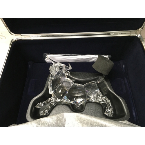 1022 - A cased Swarovski Crystal 2004 bull figure. Limited edition number 2587 of 10000. Designed by Adi St... 