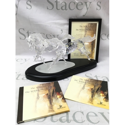1023 - Swarovski crystal glass cased The Wild Horses 2001 figure group. Limited edition 4652 out of 10000. ... 