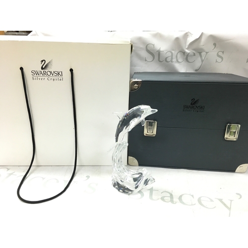 1028 - A boxed Swarovski crystal glass Maxi dolphin figure, 20cm tall. No obvious damage or restoration