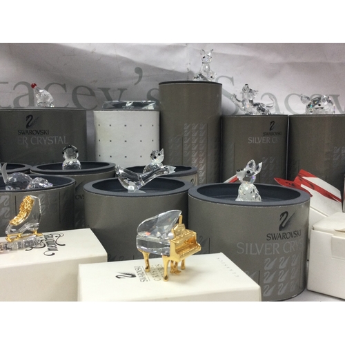 1103 - A collection of boxed Swarovski figures , no reserve