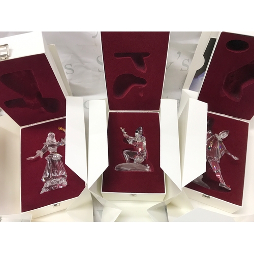 1106 - Three boxed Swarovski crystal glass masquerade figures. No obvious damage or restoration