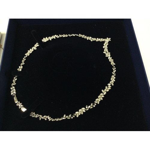 1109 - Four items of Swarovski crystal jewellery including two necklaces and two brooches