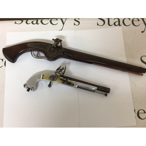 608 - A Replica Wheel lock pistol with a full length mahogany stock and unusual Aluminium and brass replic... 