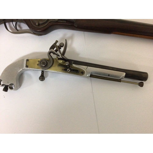 608 - A Replica Wheel lock pistol with a full length mahogany stock and unusual Aluminium and brass replic... 