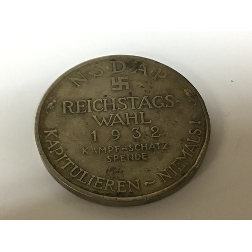 609 - A German Third Reich NSDAP 1932 medal The donation medal silver with edge stamp 990. and three retro... 