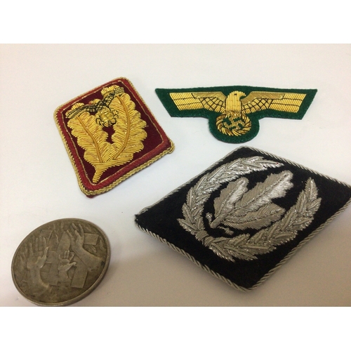 609 - A German Third Reich NSDAP 1932 medal The donation medal silver with edge stamp 990. and three retro... 