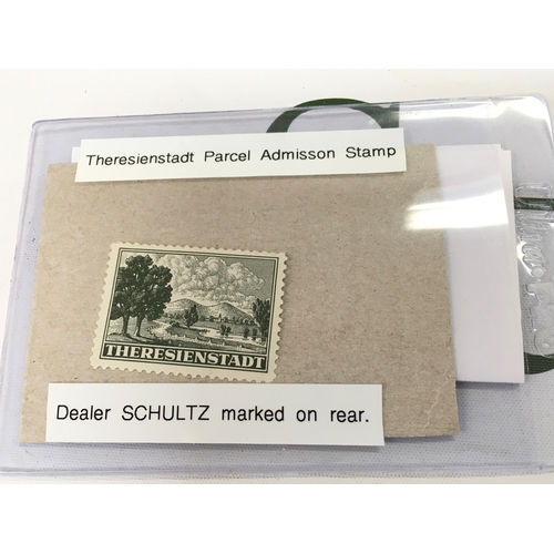 612 - A Theresienstadt Parcel admission stamp Dealer SCHULTZ marked on rear