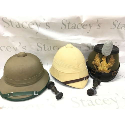 624 - Three reproduction military hats (Afrika Korps, British and German WW1 Jeager) and two stamps. No re... 