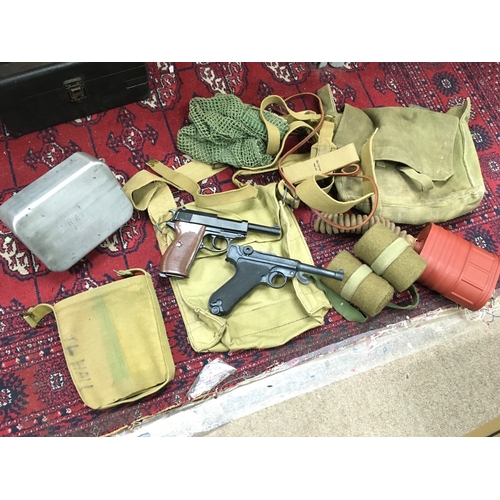 626 - An assorted collection of reproduction WW2 German field equipment. No reserve