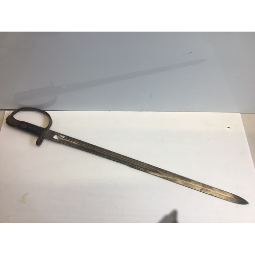 633 - A Martini Henry 1879 Sawback edge bayonet the blade with military stamp marks no scabbard.