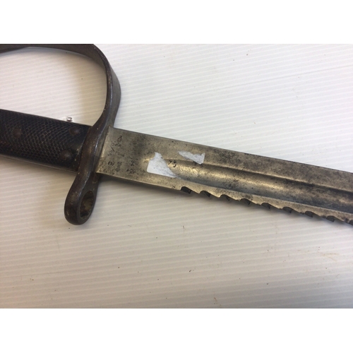 633 - A Martini Henry 1879 Sawback edge bayonet the blade with military stamp marks no scabbard.