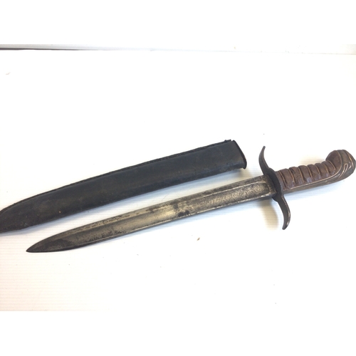 648 - A 19th century short sword the steel blade with faint inscription wired grip and leather scabbard. L... 