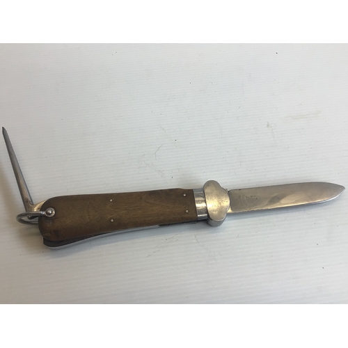 649 - A German Third Reich Luftwaffe II world war Paratroopers gravity Knife with a wood grip maker SMF So... 
