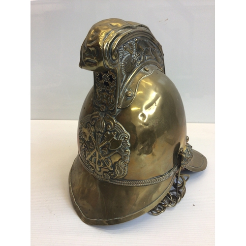 653 - A Victorian brass FiremanÕs helmet.