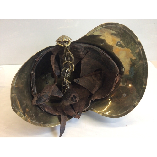 653 - A Victorian brass FiremanÕs helmet.