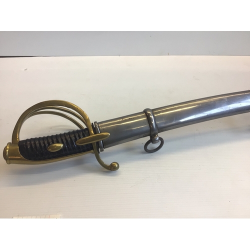 660 - A French Empire AN IV Dragoon sword with an engraved steel blade brass guard and steel scabbed.