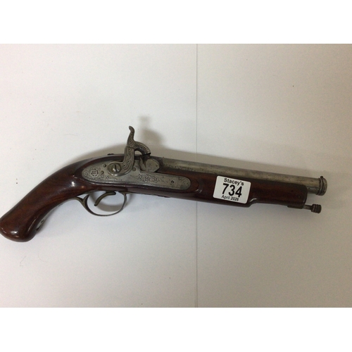 734 - A 19th century Percussion pistol with engraved steel action and canon type steel barrel walnut stock... 