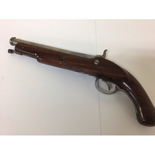 734 - A 19th century Percussion pistol with engraved steel action and canon type steel barrel walnut stock... 