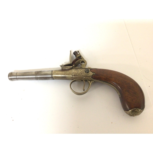 742 - A Replica flintlock pocket pistol with a detachable steel canon barrel brass action and mahogany gri... 