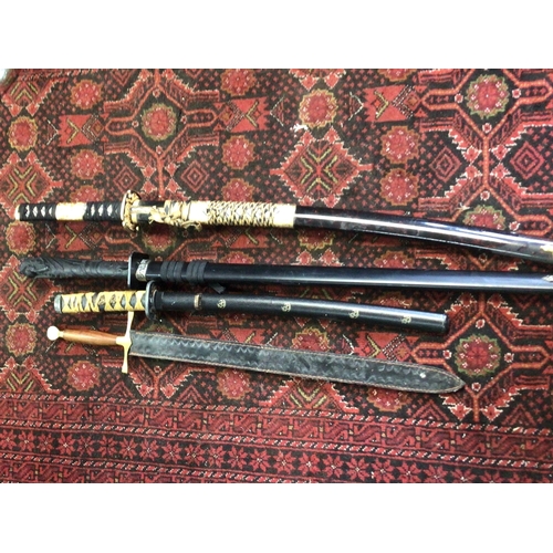 931 - Two 20th century Japanese Ceremonial Samurai Swords with elaborate decoration a Tanto and one other ... 