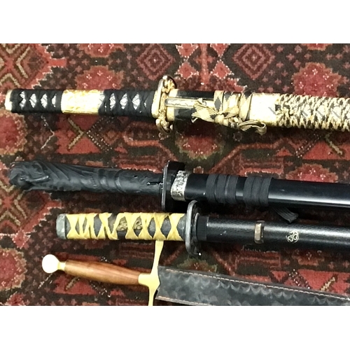 931 - Two 20th century Japanese Ceremonial Samurai Swords with elaborate decoration a Tanto and one other ... 