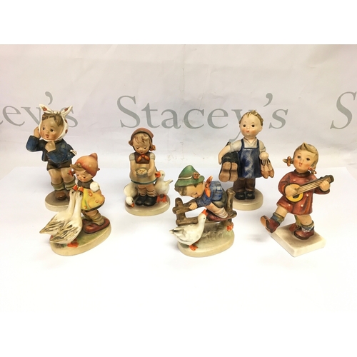1269 - Six Goebel Hummel figures of children.