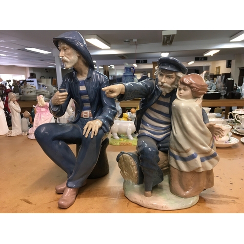 1282 - Two large Lladro figures of Fishermen. Largest one 39cm in height approximately