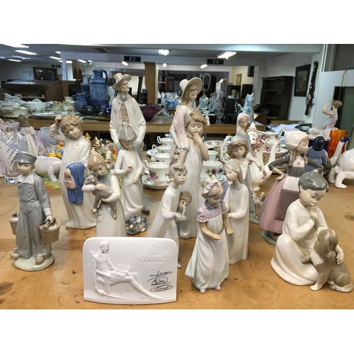 1284 - A collection of Lladro figures including gurl with lamb, various sizes. Some A/F