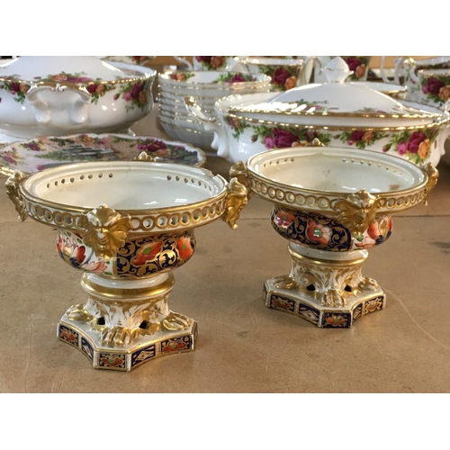 1286 - A pair of Royal Crown Derby Pot pourri vessels , in the Imari pattern, without lids- some damage