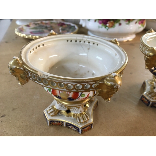 1286 - A pair of Royal Crown Derby Pot pourri vessels , in the Imari pattern, without lids- some damage