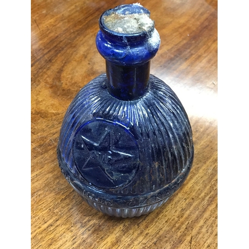 1287 - A blue glass fire extinguisher bomb. 17cm tall
