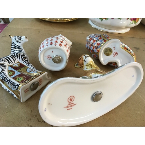 1294 - Four Royal Crown Derby paperweights in the form of Lioness, bear, walrus and zebra. All with stopper... 