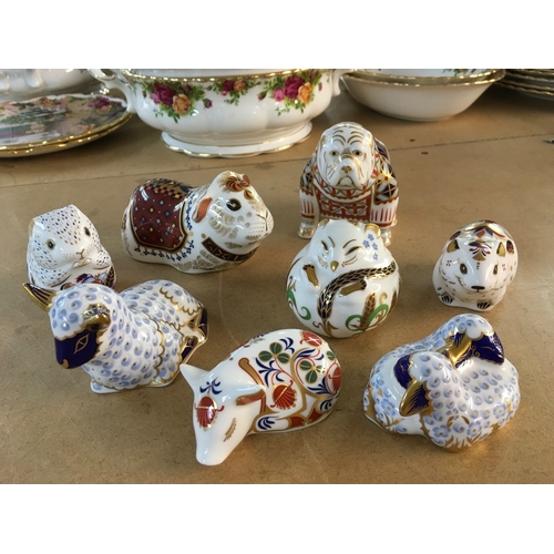 1295 - Eight Royal Crown Derby paperweights in the form of animals including Bull Dog, Hamster, Piglet, lam... 