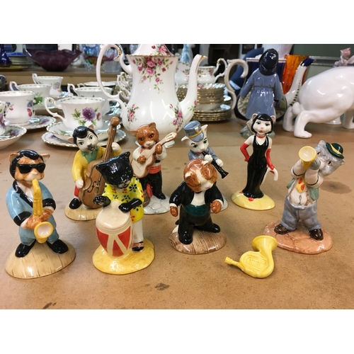 1303 - A collection of Beswick cat figures playing instruments