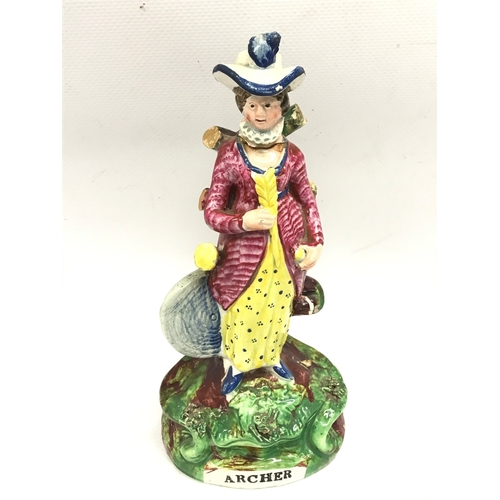 1306 - An early 19th century Archer Pearl ware figure (some damage )