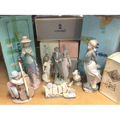 1319 - A collection of boxed Lladro and Nao figures