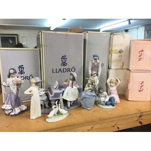 1321 - A collection of boxed Lladro and Nao porcelain figures including Jazz Duo, Flor Maria, like father l... 