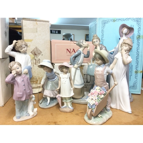 1322 - A collection of Lladro and Nao porcelain figures including Gossips, Girl with hoop , some boxed (8)
