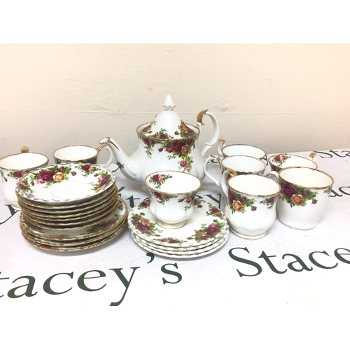 1325 - A Collection of Royal Albert old English Country Rose bone china comprising a tea pot coffee cups te... 